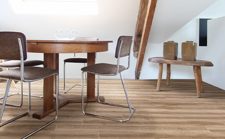 warm toned wood look laminate flooring in small office space